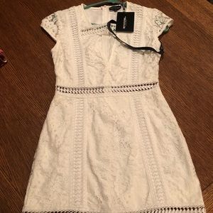 Never been worn, Little White Dress!